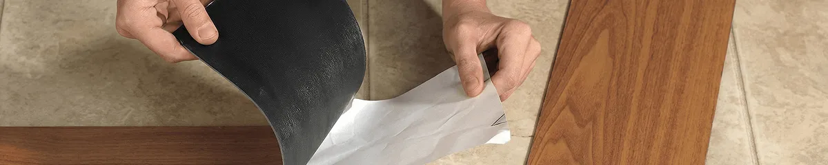 A professional installing vinyl flooring in Fort Wayne, IN